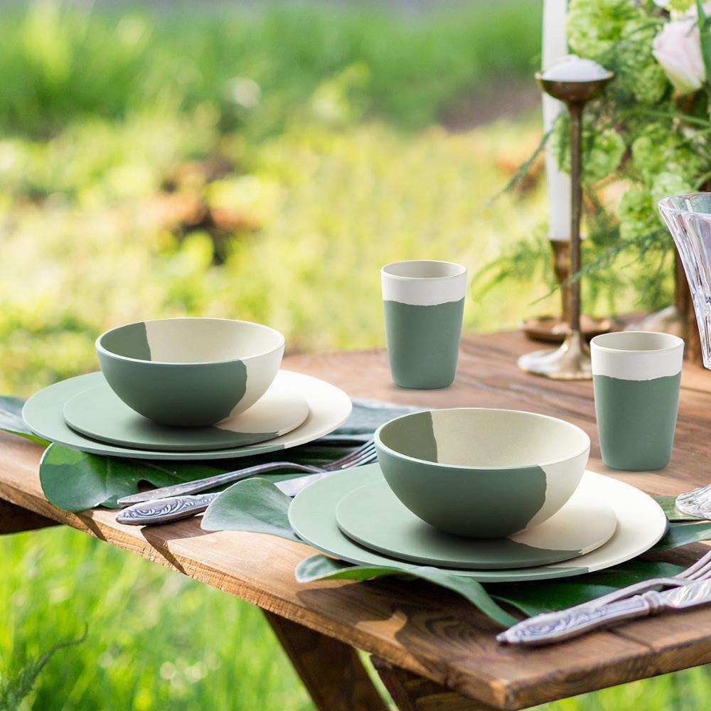 a table with plates and cups on it