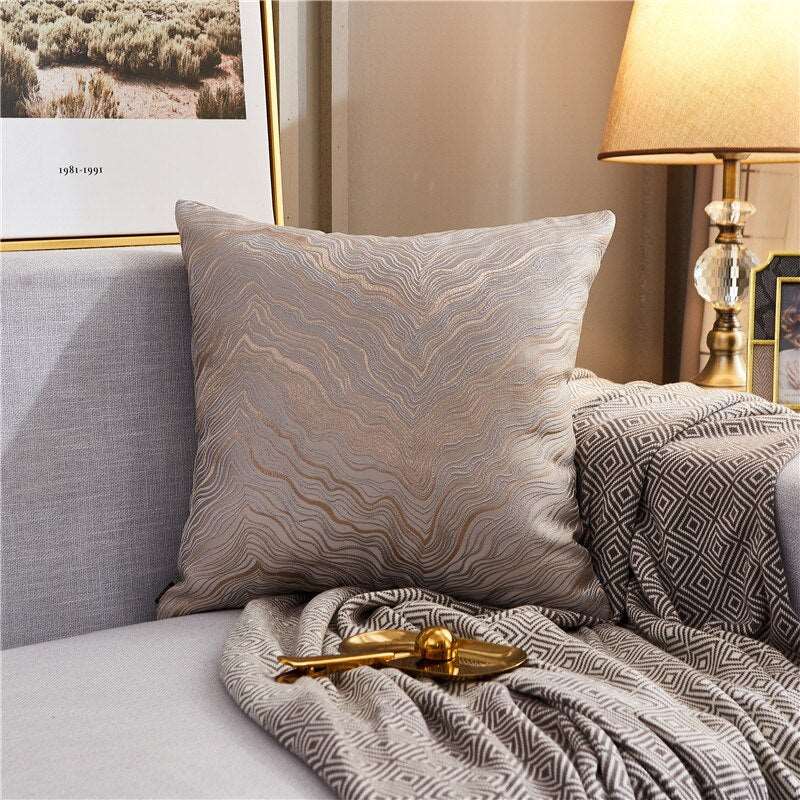 a bed that has a blanket on it