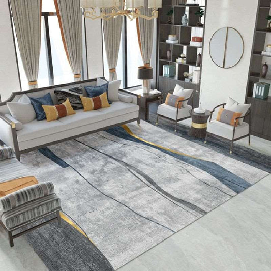 a living room filled with furniture and a fire place
