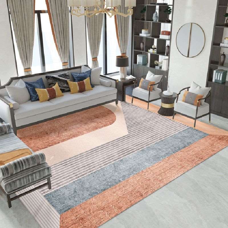 a living room filled with furniture and a fire place