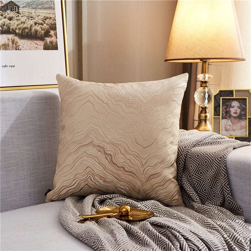 a bed that has a blanket on it