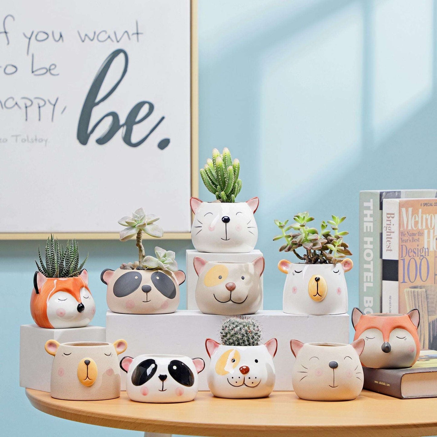 a group of vases that are on a shelf