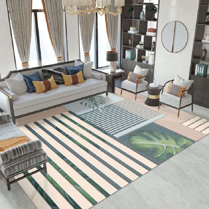 a living room filled with furniture and a table