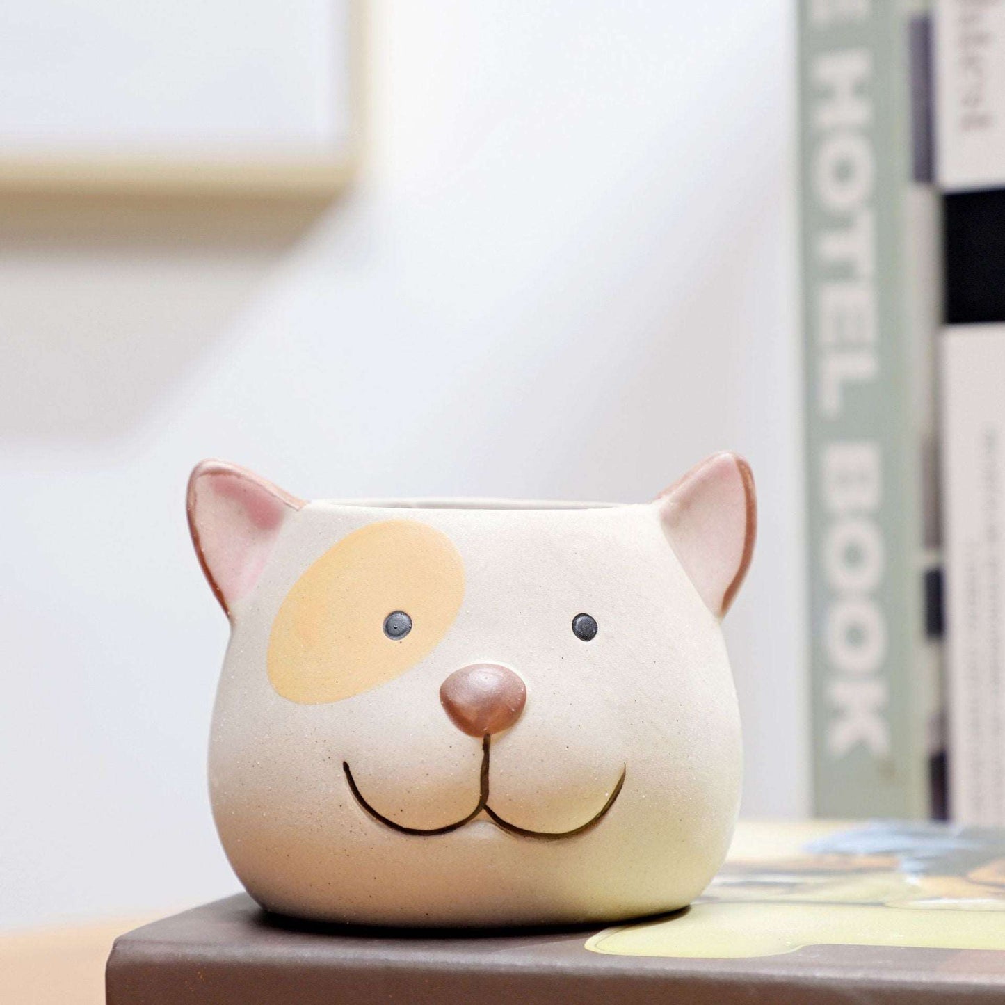 a stuffed animal is sitting on a table