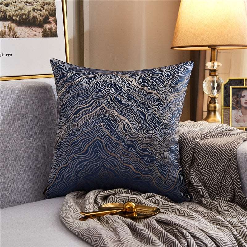 a bed that has a blanket on it
