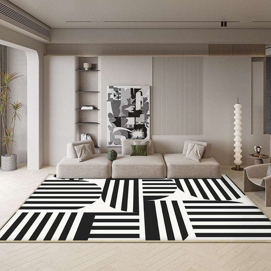 a black and white photo of a bed in a room