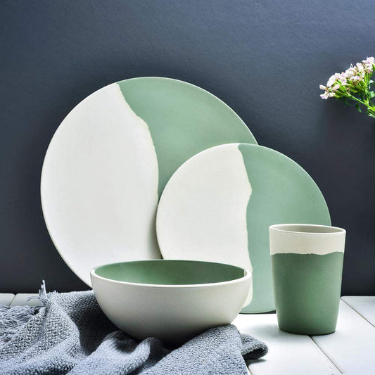 a table with a bowl and a cup on it