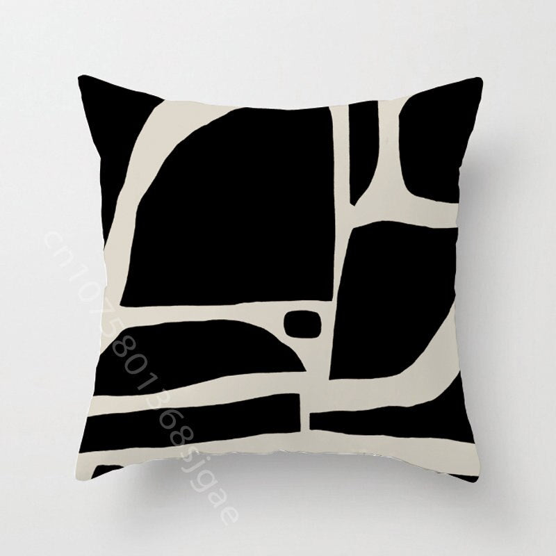 a black and white picture of a black and white pillow