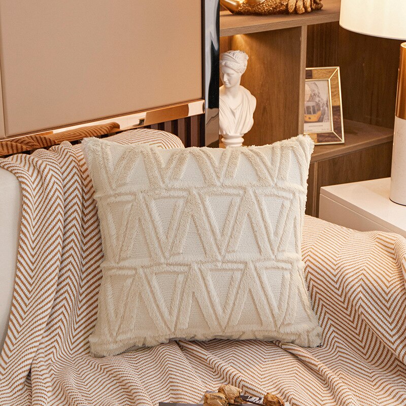 a hotel room with a neatly made bed