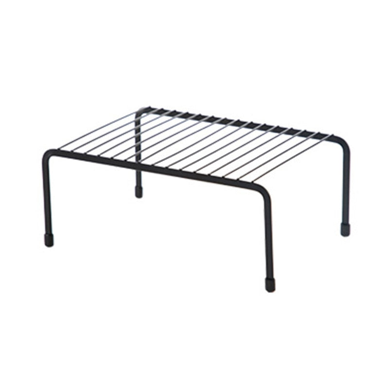 a metal object that is hanging from a wire