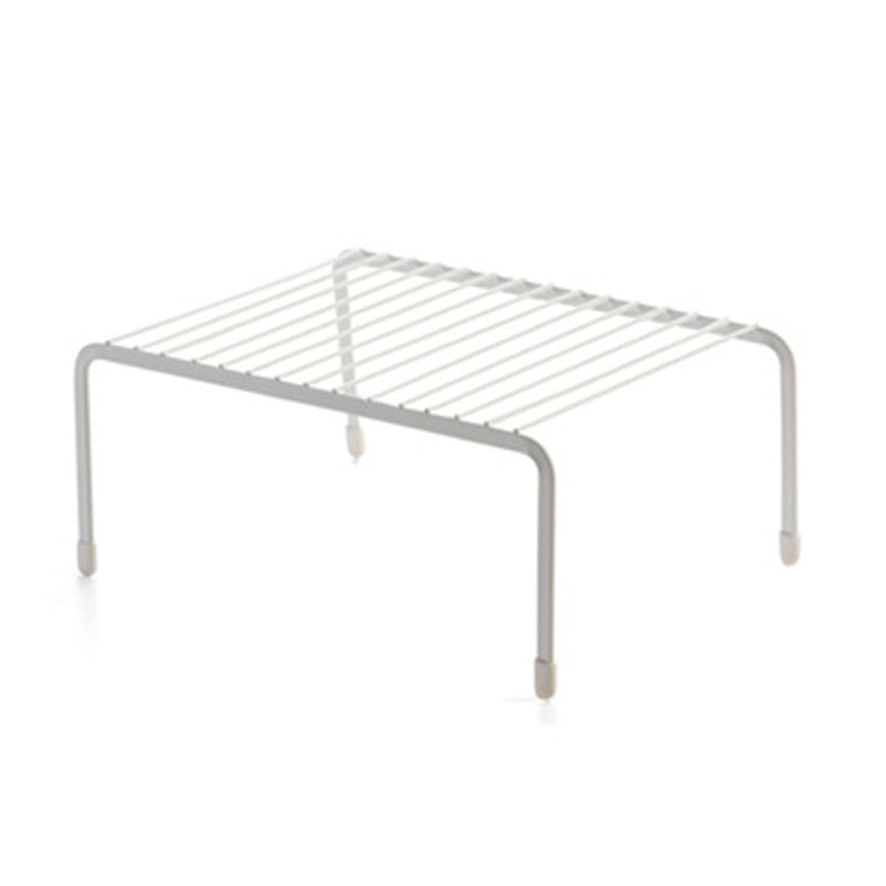 a black and white photo of a metal chair