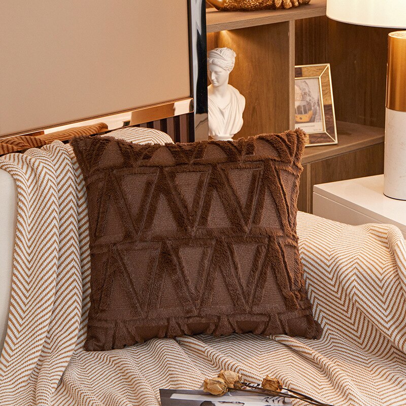 a bed that has a blanket on it
