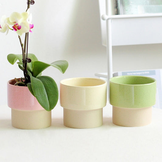 a couple of cups that are on a table
