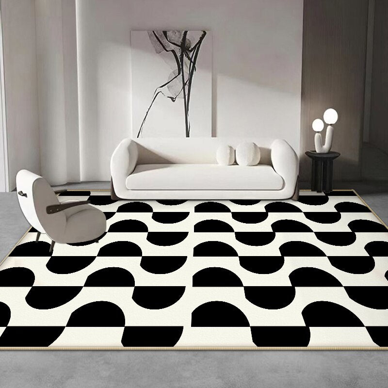 a black and white photo of a bed in a room