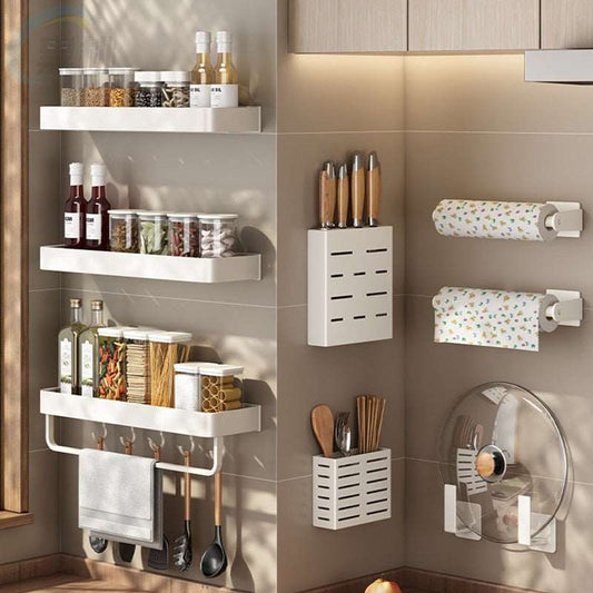 a kitchen filled with lots of clutter and appliances 