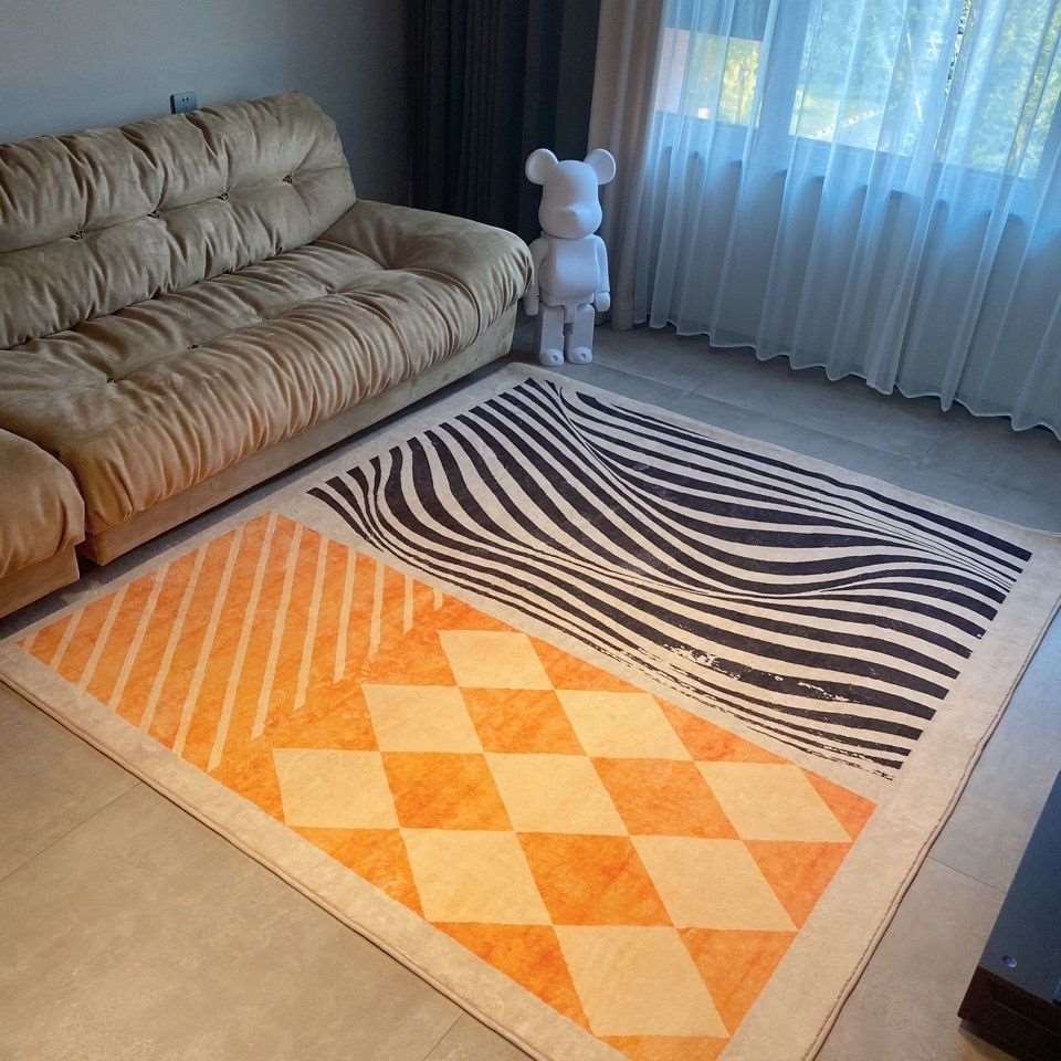 a living room filled with furniture and a rug 